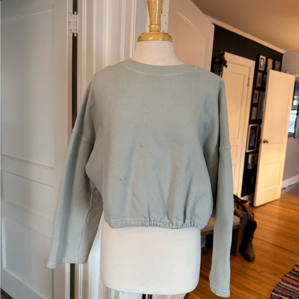 Fabletics Pale Blue Cropped Sweatshirt with Open Back and Tied Waist